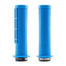 Load image into Gallery viewer, Two blue DMR Gridlock bicycle handlebar grips with 'Gridlock' branding on a white background