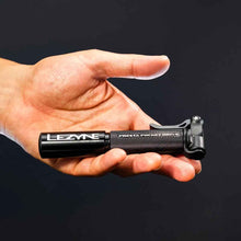 Load image into Gallery viewer, Lezyne Presta Pocket Drive Mini Pump held in a hand against a black background